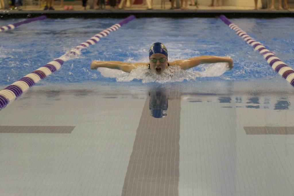 Caitlin McCandler 15 powers through her 100 butterfly.