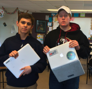 Jimmy Gruver '17 and Reece Sanders '17 prepare to say "good-bye" to their old laptops.  