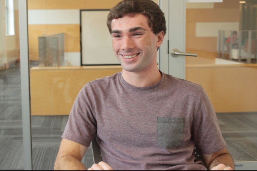 Ben Weinshel 15 smiles for a quick photo as he describes his internship at the tech department this summer.