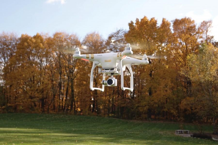 Recreational quadcopters can be retrofitted to hold cameras and can fly up to a mile away from the controller.