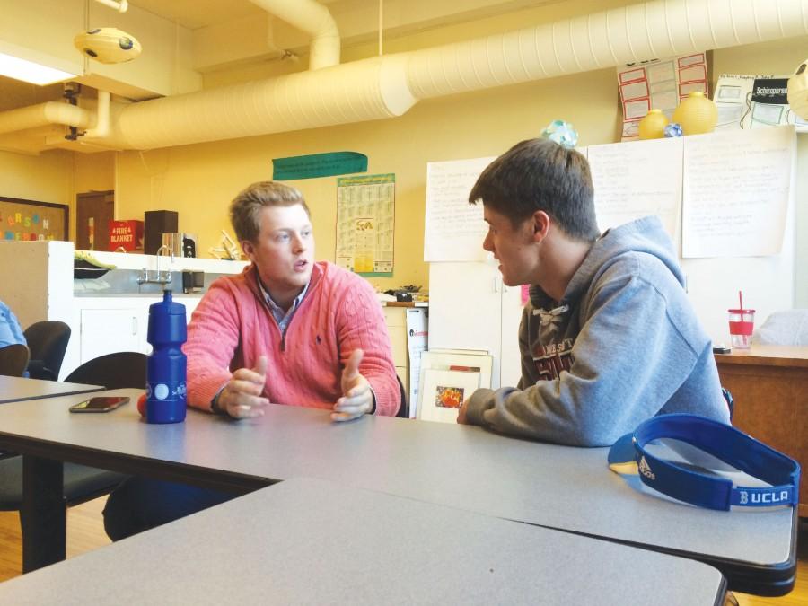 Reece Sanders ‘17 and Will Bean ‘17 discuss a plan of action.