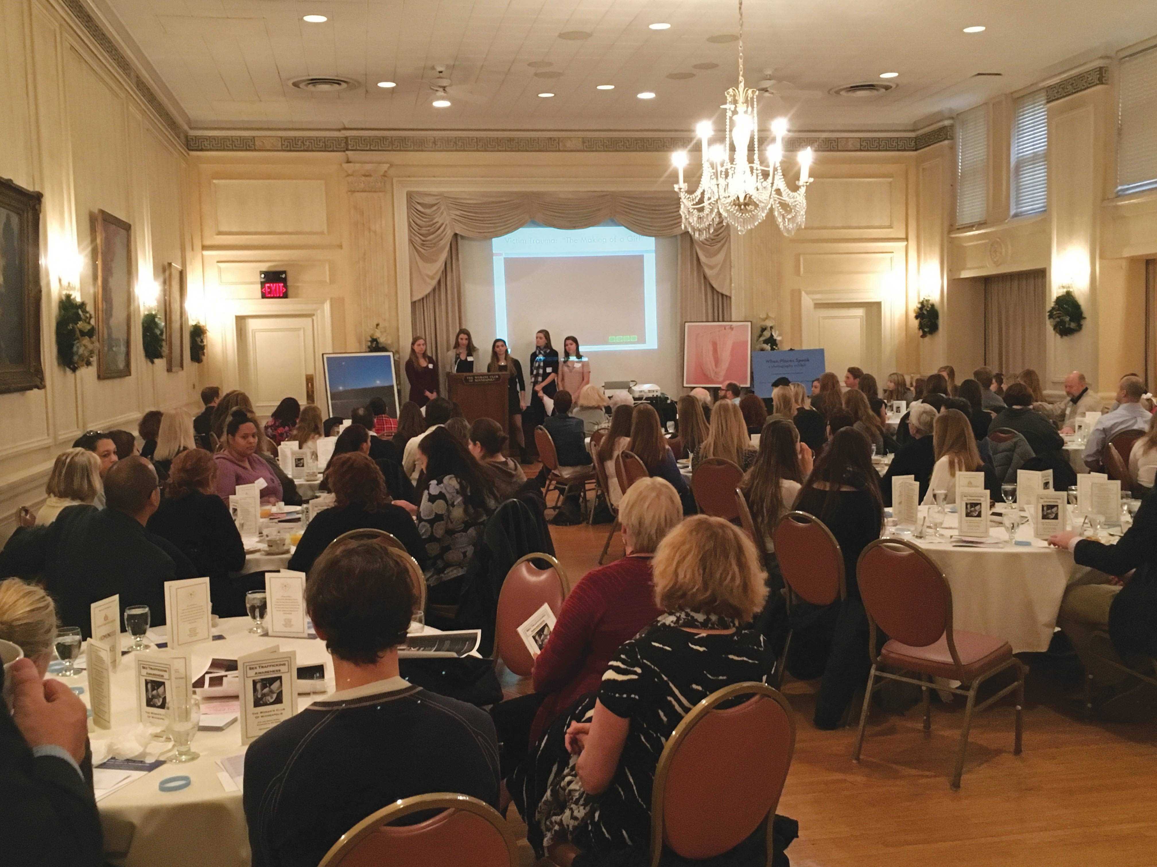From left: Libby Rickeman ‘17, Sophie Smith ‘17, Raye Gleekel ‘17, Isabel Hall ‘16, and Lucy Burton ‘17 present to a crowd of over 100 on sex trafficking awareness.