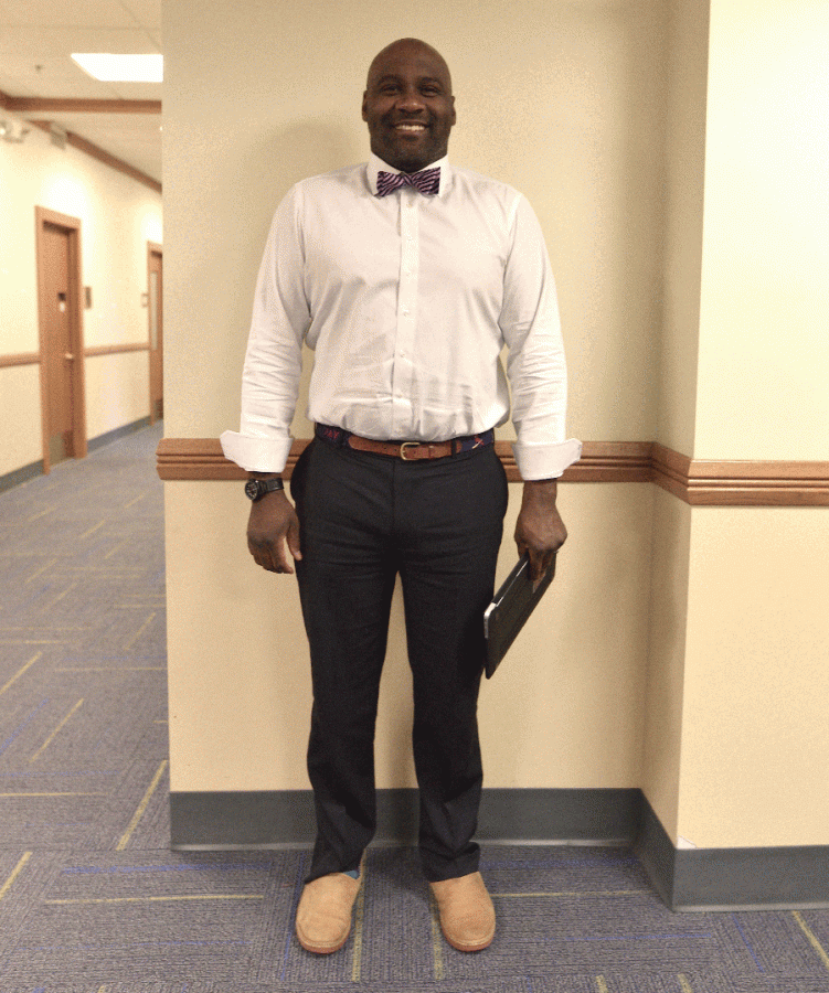 Jarrett Young with his signature bow tie smiles for the photographer