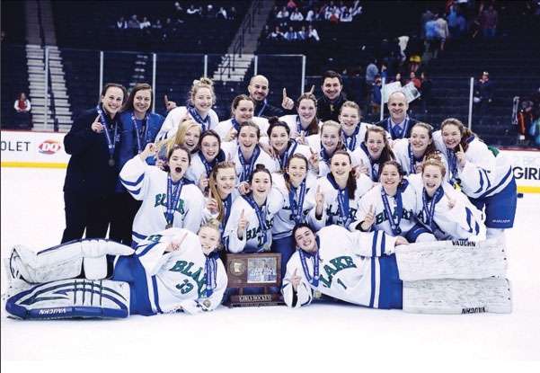 The girls laud their well-deserved State Championship after an 8-0 win over SPU. 