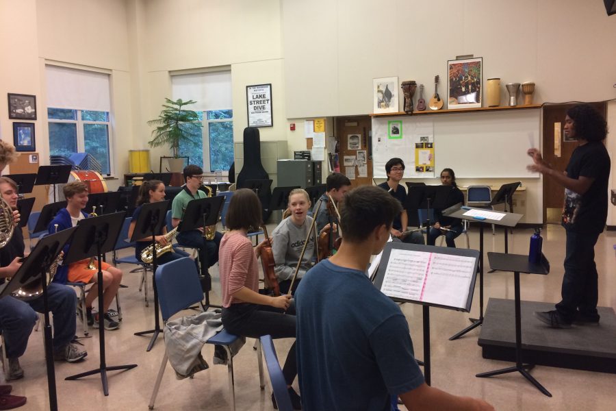 Ursa Major in a practice session. Julien Ueda 17 conducts the group for the upcoming concert. 