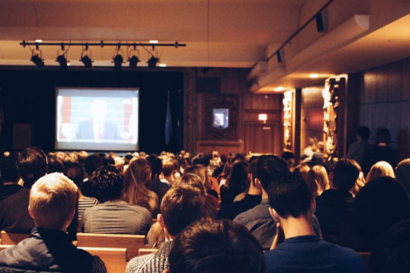 Students sit in the JNA watching the inaugural address while others decided to walk out, exercising their right to not watch it while accepting the consequences. 