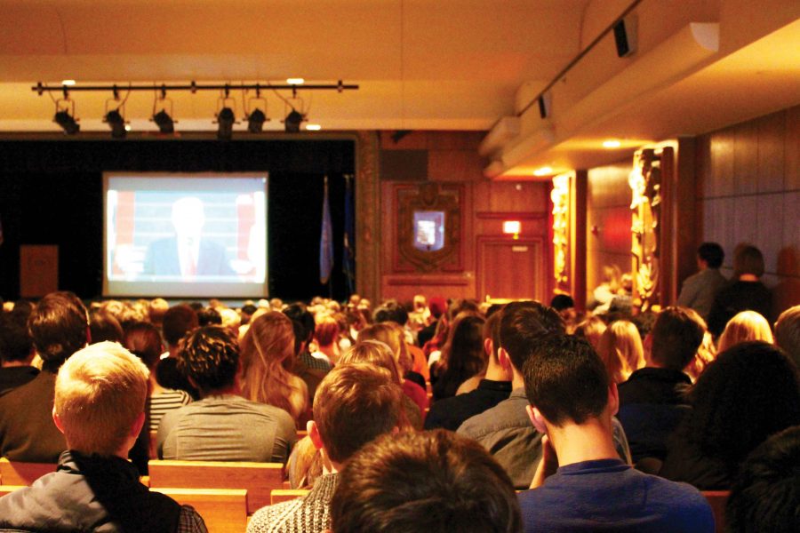 Students watch the inauguration of Donald Trump live in the Julliet Nelson Auditorium while some students chose to leave and accept the consequences. The students who peacefully protested left after the new president was sworn in. 