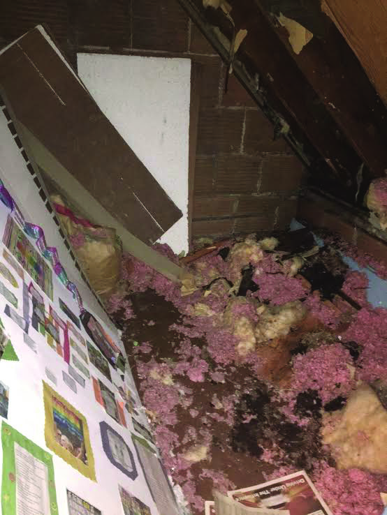Top to bottom: Insulation, along with debris from the ceiling of Anna Reid’s closet, created a mess in the halls Tuesday morning. Consequentially, a large hole in the ceiling of the gym instituted an odd assortment of chaos.