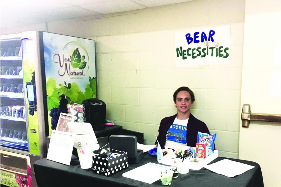 Nico Udris ‘19, a DECA member, is working the store during first lunch. Udris is one of the 20 volunteer workers on DECA. Those who work the store get a discount on goods. 