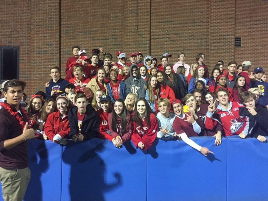 Students on bleachers of new student section theme red for Minnehaha High School homecoming game against Washburn on September 21. 