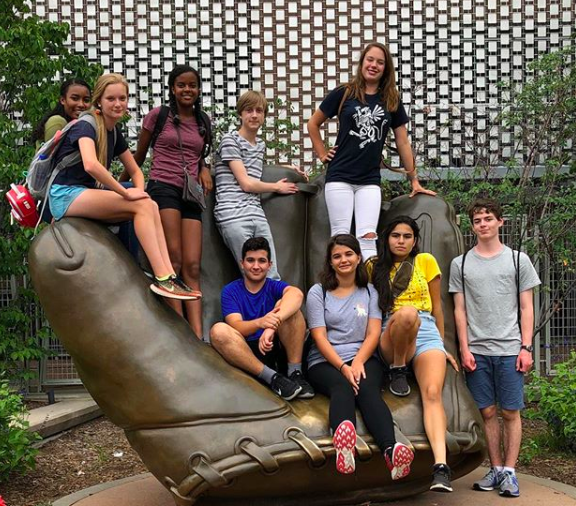 Shenelle Haines advisory  visits a sculpture near Target Field, the home of the Minnesota Twins. The advisory that found the most things from the checklist (given out before the walk began) will receive a prize in the weeks following the annual Sophomore Walk. 