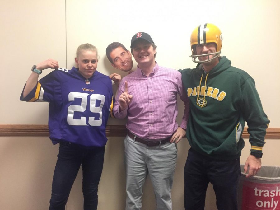 Maggie Bowman, Jim Mahoney and Patrick Barry supporting their respective teams, the Minnesota Vikings, the Boston Red Sox, and the Green Bay Packers 