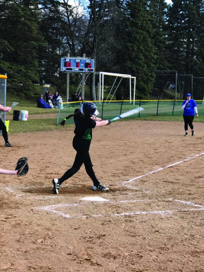 Kenna Vavricheck 21 makes good contact with the ball as she swings.