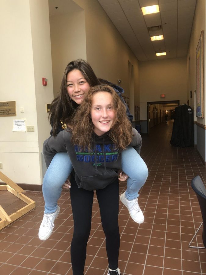 Becky Perkins '22 and Lilli Haselhorst '22 are ready for the Homecoming game in their Blake wear 