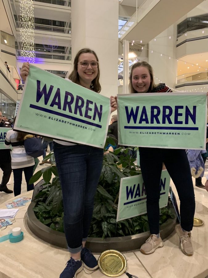 Amanda Ward 21 and Nora Cornell 21 campaign for Elizabeth Warren. 