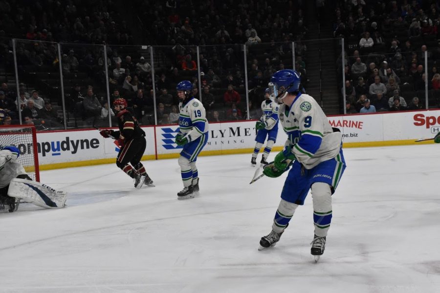 The Boys Hockey team competes against the Eagles from Eden Prairie in the state semi-final game, eventually losing 4-1.