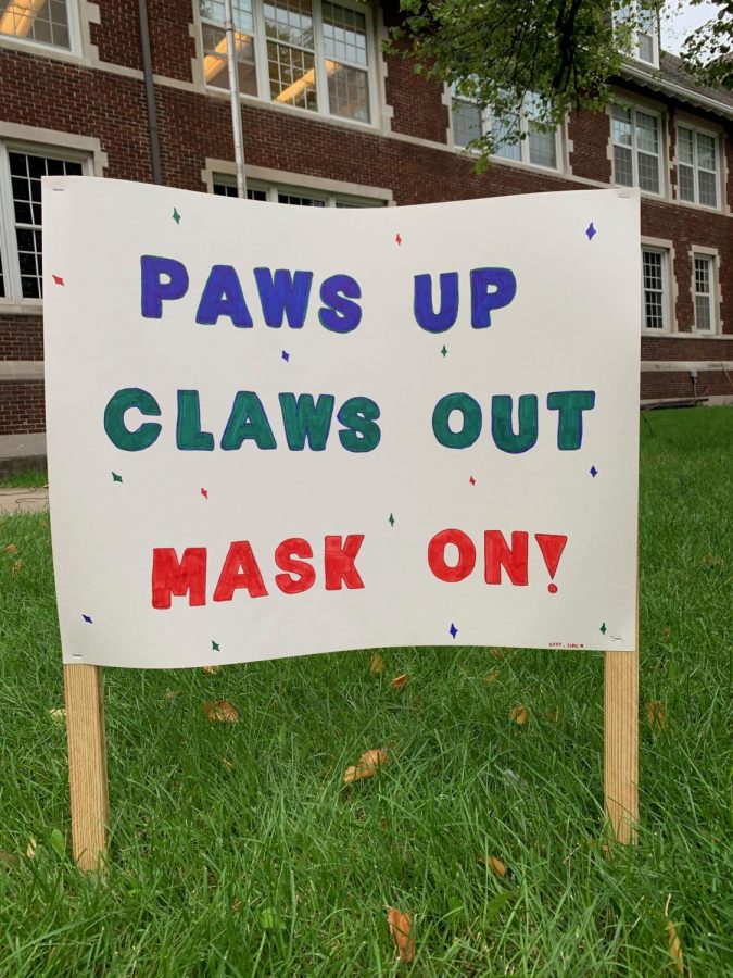 SIAC makes fun posters to remind students to stay safe and keep their masks on. 