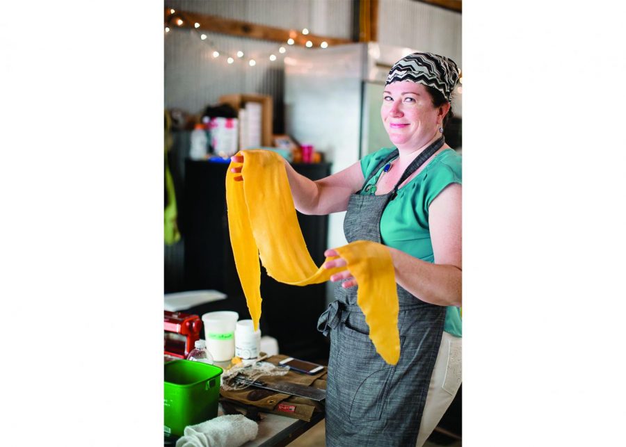 Thomas makes homemade pasta at Threshing Table Farm, a farm in Wisconsin. She partners with them for farm fresh produce and also has farm dinners outside.