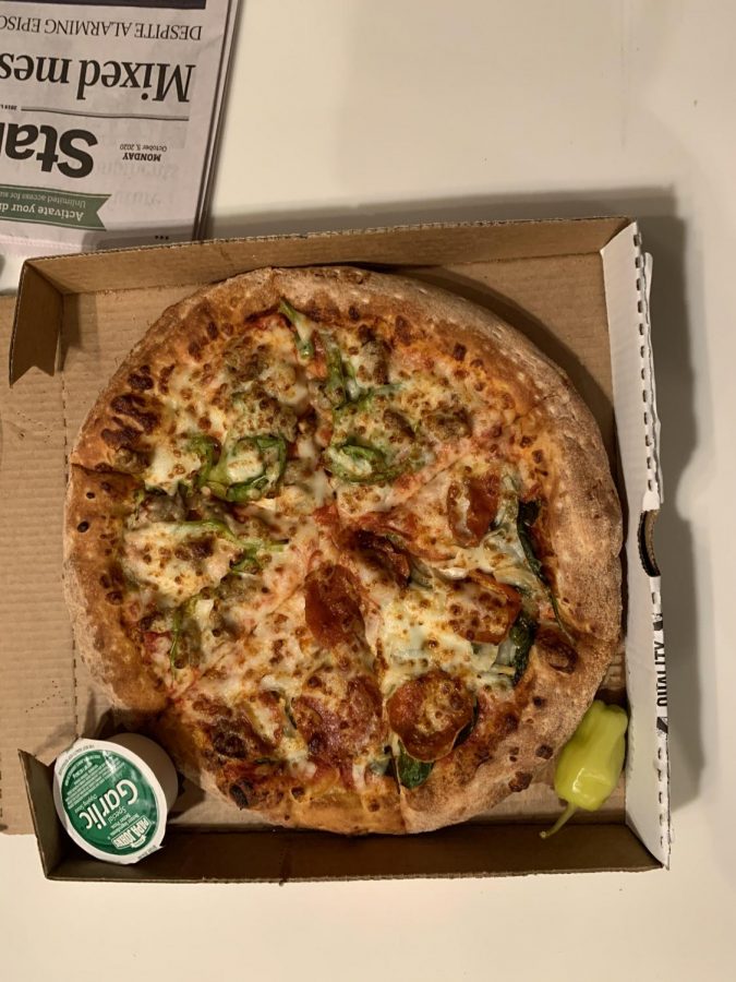 Papa Johns pizza sits in its box.