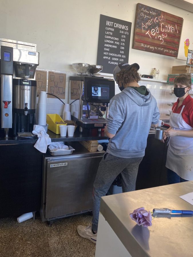 Aksel Reid ’21 works early in the morning before school starts.  He mainly serves customers.