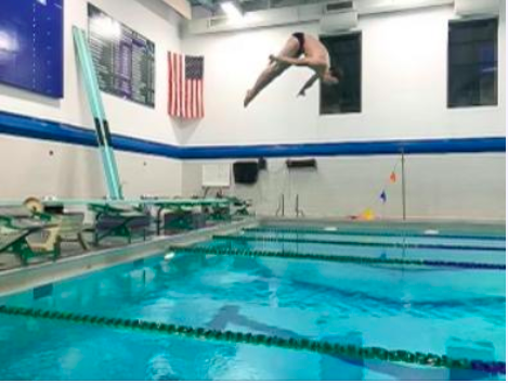 Collin Craig ’24 preforms a dive during practice this season.