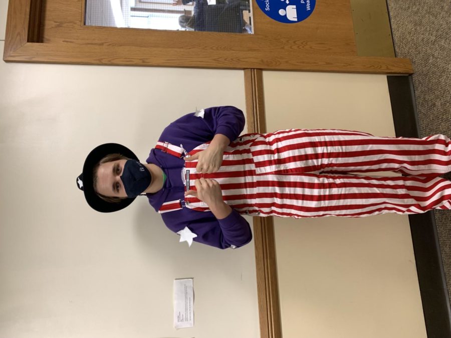 Henry Schmidt 23 happily poses in his USA day attire. He even stuck on white stars onto his sweatshirt to look like the American flag. 