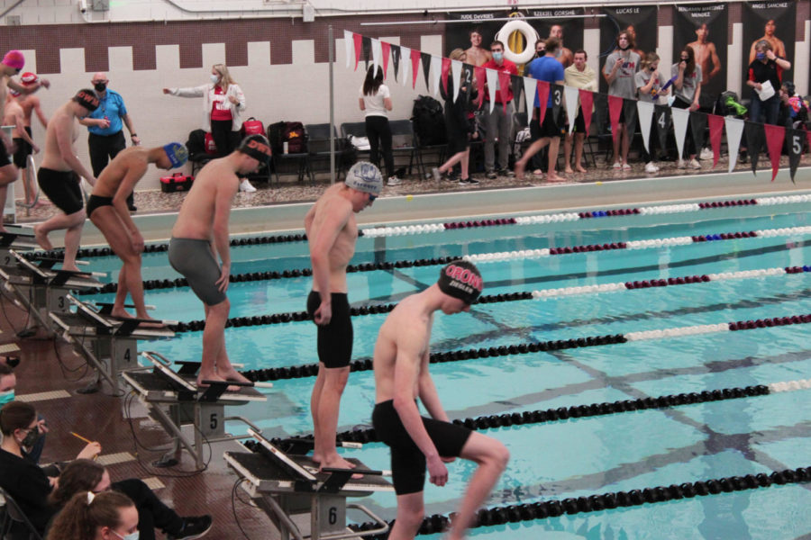 Wyatt Dayhoff ‘22 and Liao getting ready for the 200 IM at section prelims. Liao finished 3rd at section finals with a time of 1:58.71 seconds which qualified for state! 