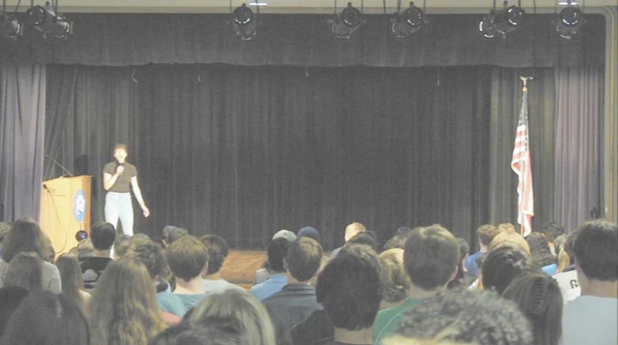Thompson sings “Lift Every Voice and Sing” which is commonly known as the Black national anthem. To Thompson’s right is the American flag, which is rarely on stage during assembly. Students were instructed to stand and direct their attention to the front, as if they were listening to the “Star Spangled Banner.” Students and faculty were filmed for a national project.