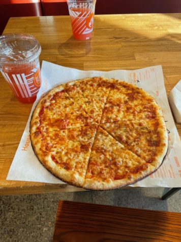 Cheese pizza that was just enough to fill one person. Blaze Pizza is open from 11a.m.- 9p.m. every day of the week.