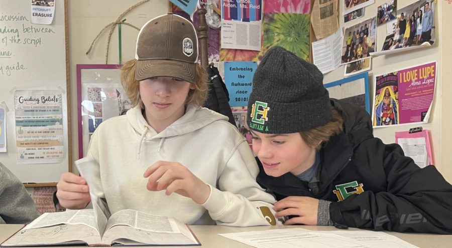 Max Vinar ‘26 and Jack Mark ‘26 from Anna Reid’s advisory look up the word integrity in the Merriam Webster Dictionary.   