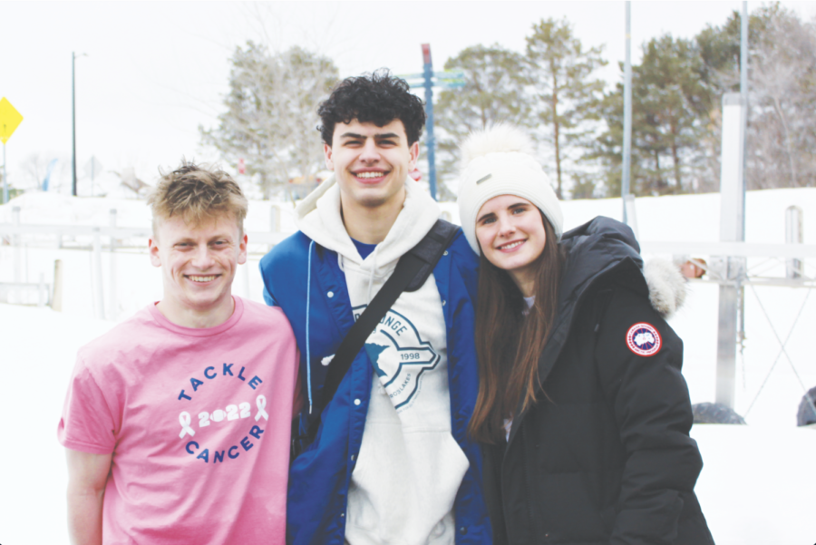 Zach Weiner 23, Mehra, and Caroline Pollack 23 after they plunged. In this location of the Polar Plunge $201,079 was raised.