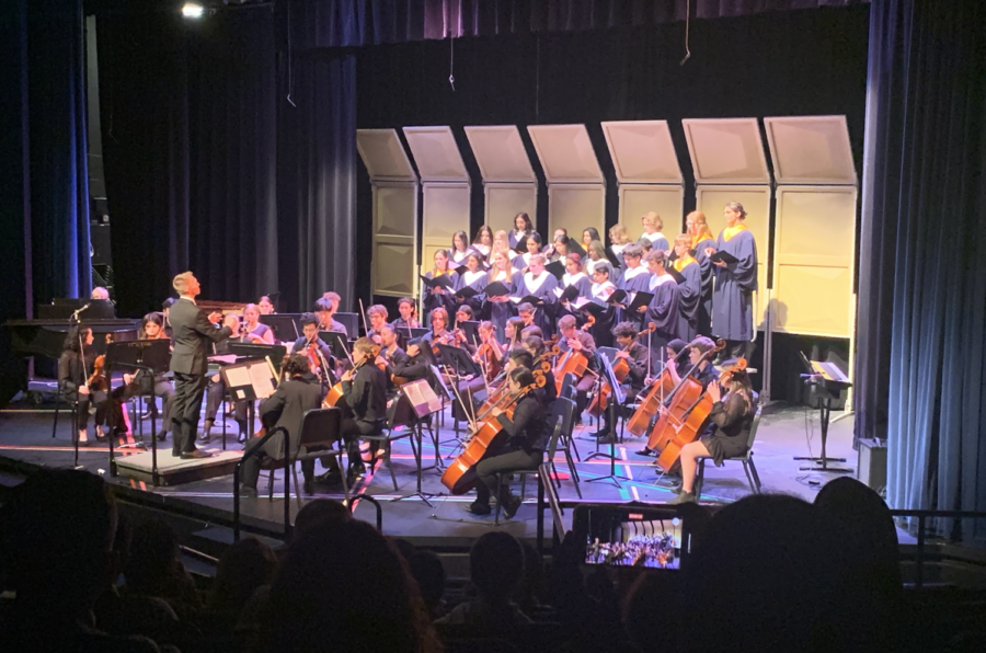 The choir and orchestra prepare to play together in the MPAC.