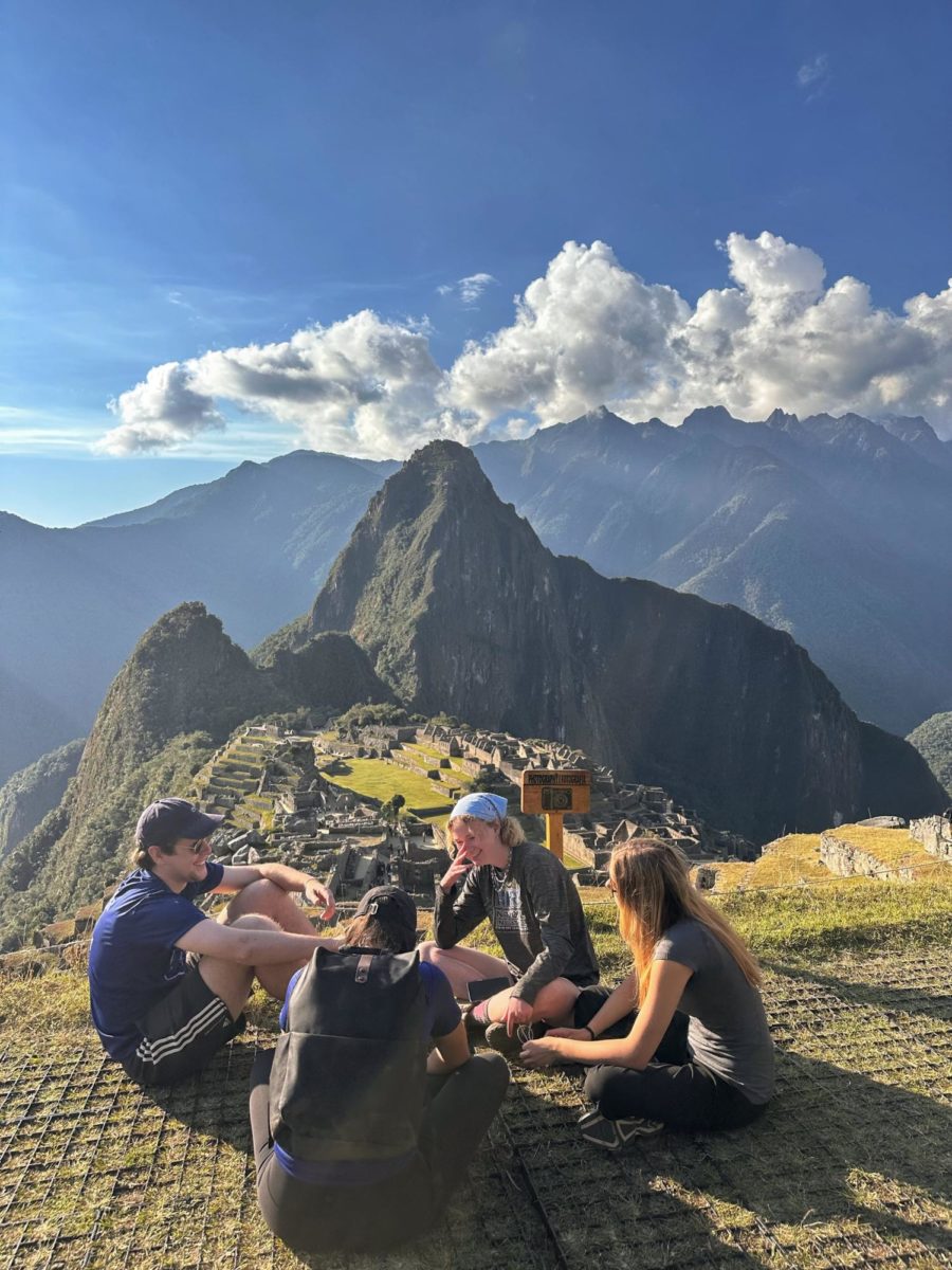 Ekstrom+%28far+right%29+sits+with+friends+during+a+visit+to+the+historical+Macchu+Picchu+in+Peru%2C+getting+to+see+the+site+in-person+after+learning+about+its+significance+in+Blake+Spanish+classes.