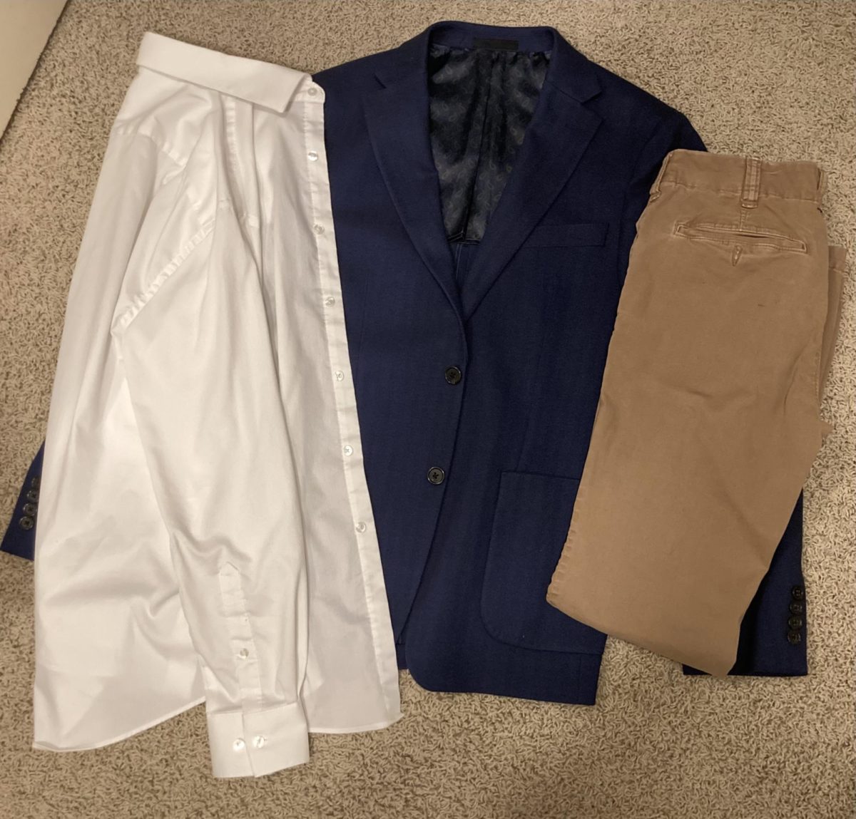 Yousha’s spectacular homecoming outfit from last year’s dance consisted of a navy suit from Macy’s, a white button down from Nordstrom, and khakis from American Eagle.