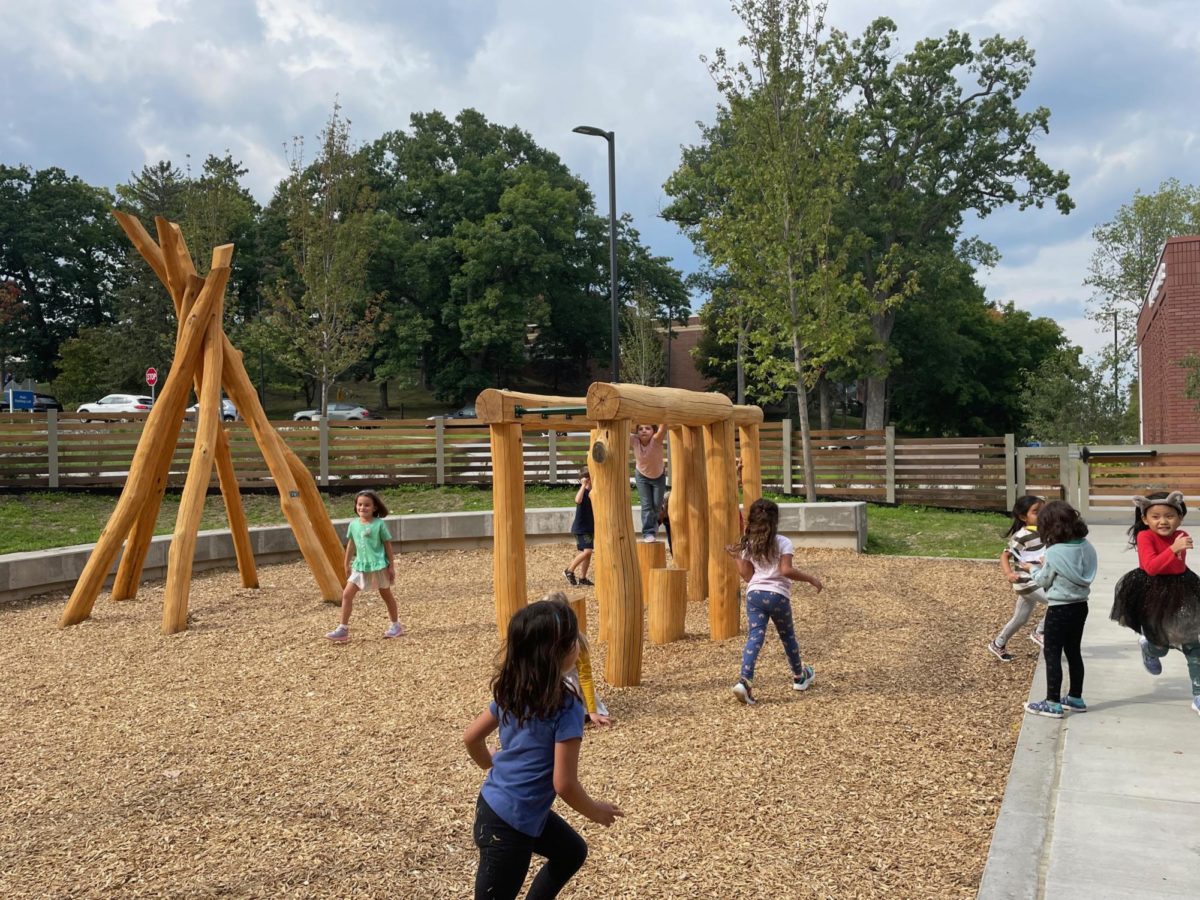 Early Learning Center students play on the El Bosque Playground, one of the four playgrounds surrounding the building. 