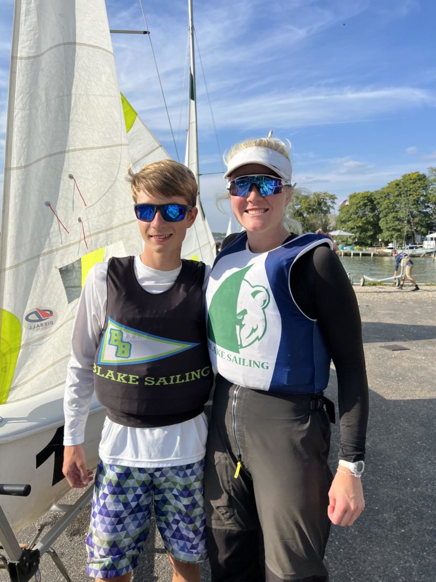 Hughes and Bower standing together after their race in Pontiac, Michigan where they qualified for the national championship.