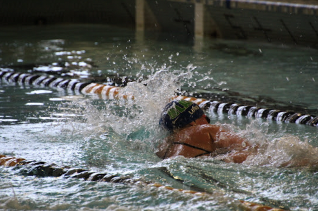 Karin+Lund+swimming+the+500+freestyle+during+a+heated+swim+meet+at+Breck.