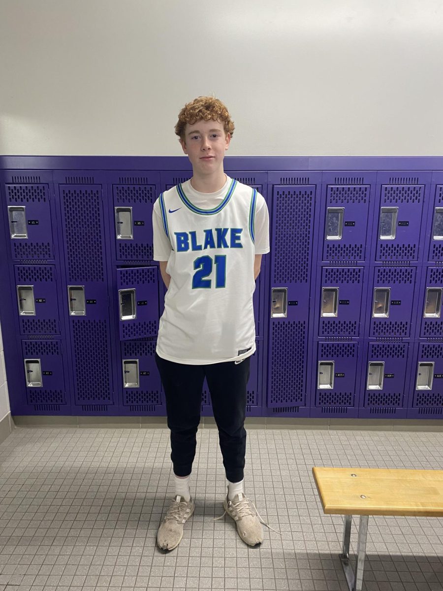 Dillon in the locker room before a game against East Central at the Red Wing High School - Tip-Off Classic.