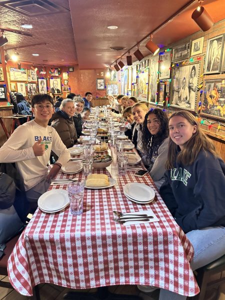 Collection of students from both choir and orchestra dine in at Buca di Beppo for dinner.