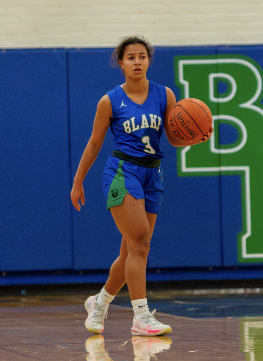 Charley Bowels 26 dribbles the ball during their last game of the season.