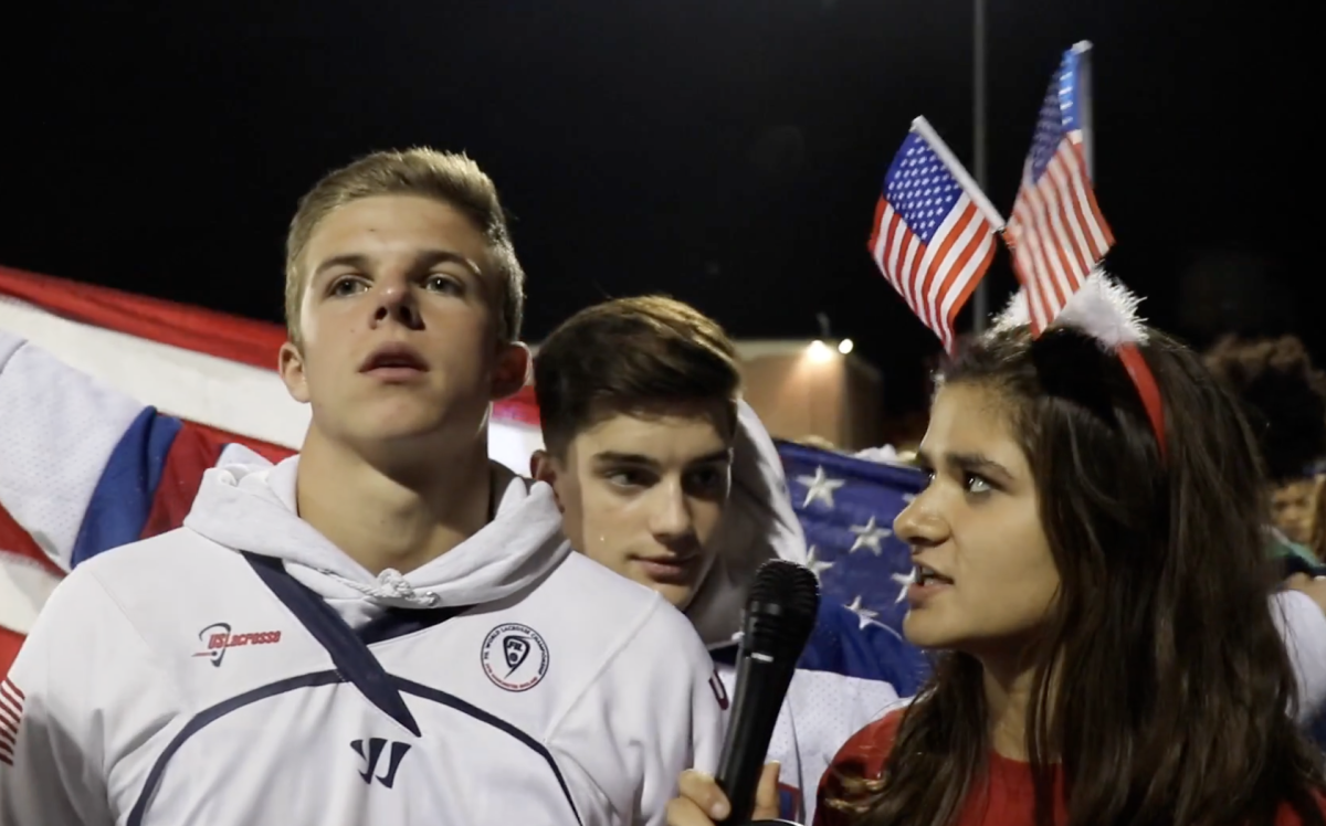 Bjorn Holm ‘18 and Jackson Saunders ‘18 are interviewed by
Maya Chadda ‘19 at the 2017 Homecoming Football
Game. The theme of the event was USA.