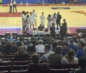 Coach Biwan (center) led the team to an unprecedented state run. The semifinal took place at Williams Arena. During this timeout on March 25, the Bears led Pequot Lake 25-22.