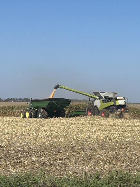 Dane is especially worried about the dryness this year. Pictured above is a combine and the collecting machine.